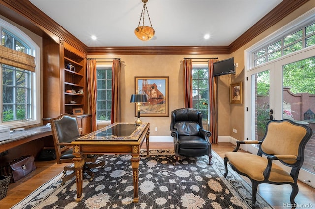 office featuring baseboards, light wood-style flooring, ornamental molding, french doors, and recessed lighting