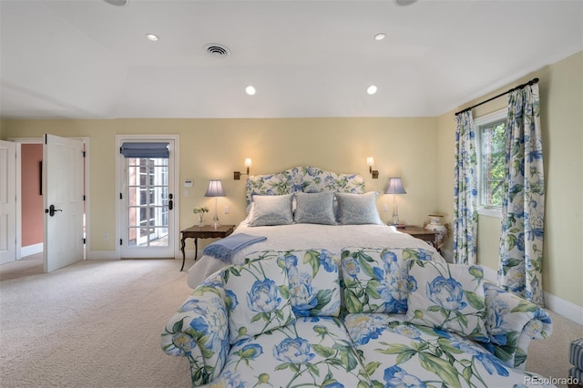 bedroom with multiple windows, recessed lighting, visible vents, and light colored carpet