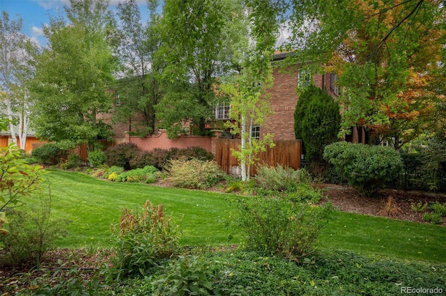 view of yard with fence