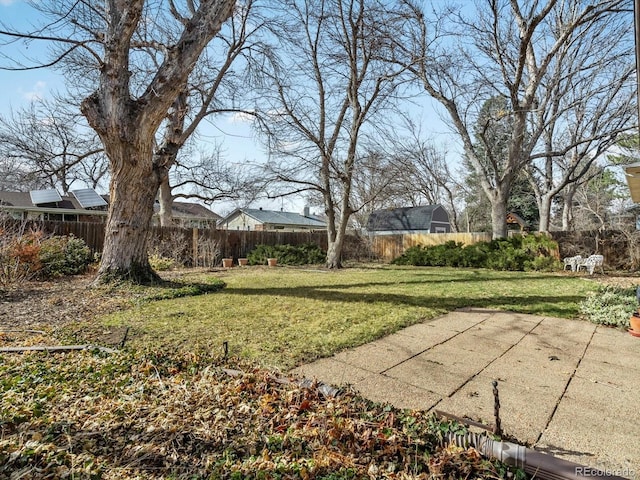 view of yard with a patio and a fenced backyard