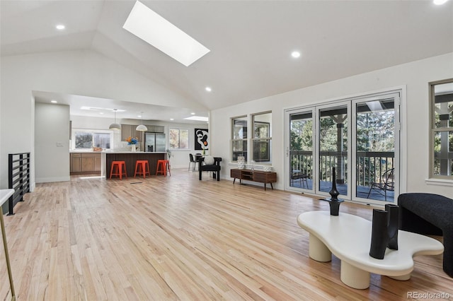 interior space featuring light wood finished floors, a wealth of natural light, and recessed lighting