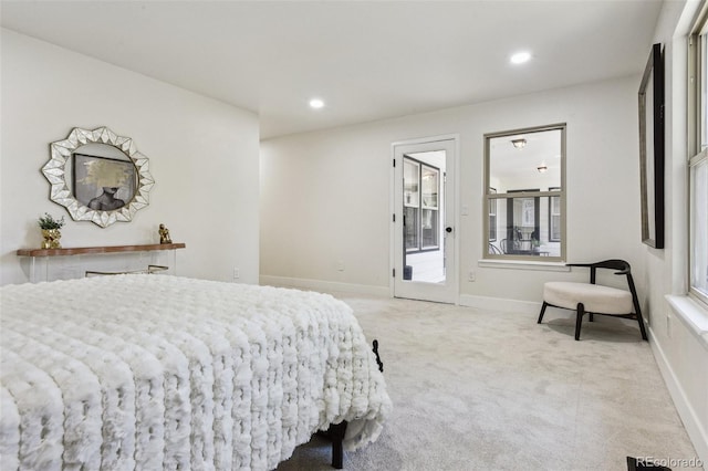 bedroom with access to exterior, baseboards, recessed lighting, and light carpet