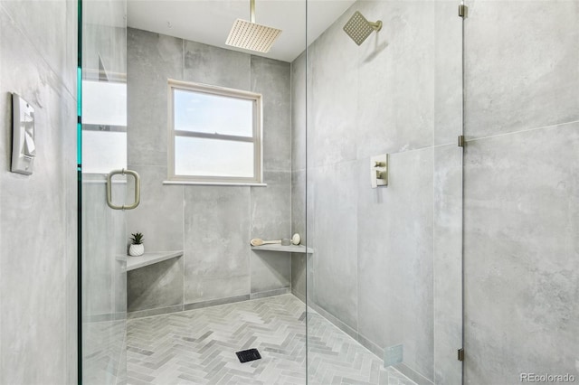 full bathroom with a shower stall