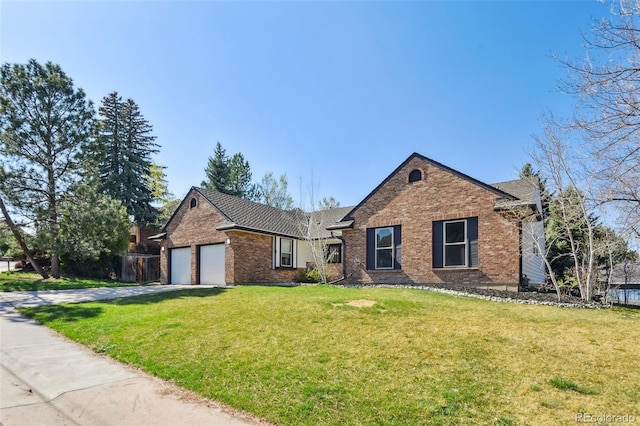 ranch-style home with fence, a front lawn, brick siding, an attached garage, and driveway