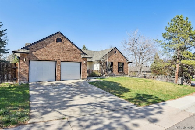ranch-style home featuring a front yard, a garage, fence, brick siding, and driveway
