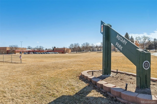 surrounding community featuring a yard