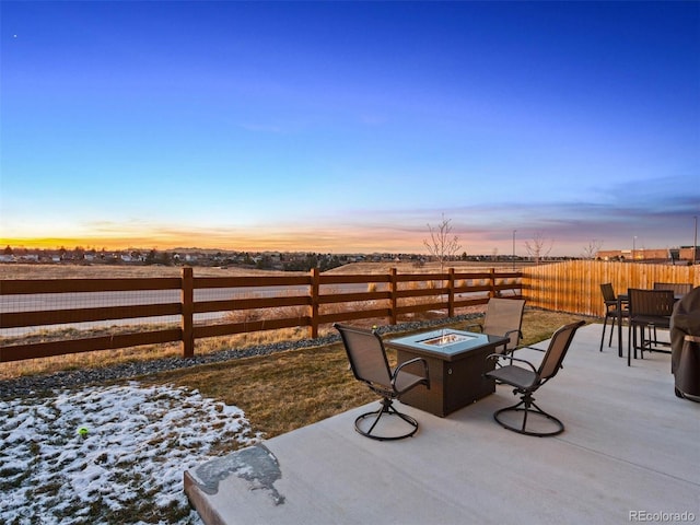 55 S Edge Cliff St, Castle Rock, CO 80104 - fenced backyard featuring an outdoor fire pit and a patio