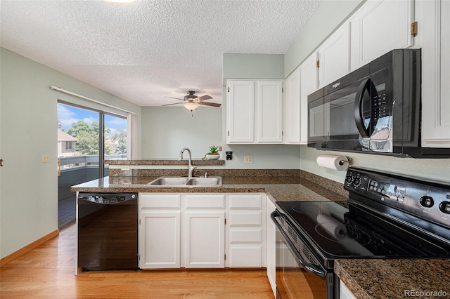 8753 W Cornell Ave Unit 12-1, Denver, CO 80227 - kitchen featuring black appliances, white cabinets, a peninsula, a textured ceiling, and a ceiling fan