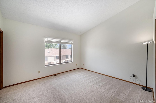 8753 W Cornell Ave Unit 12-1, Denver, CO 80227 - spare room featuring light carpet and baseboards