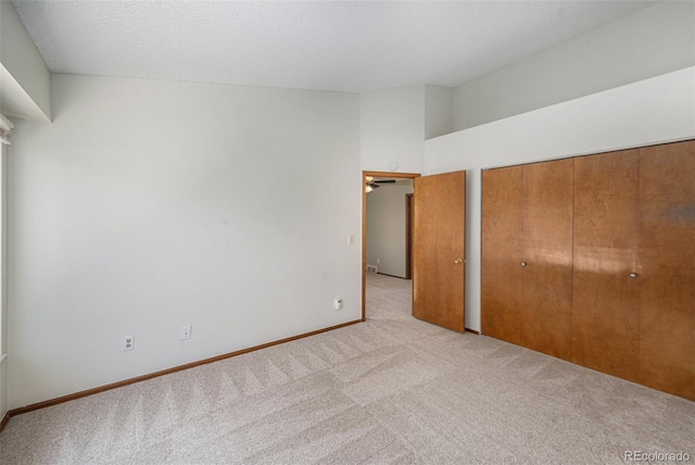 8753 W Cornell Ave Unit 12-1, Denver, CO 80227 - unfurnished bedroom with carpet and baseboards