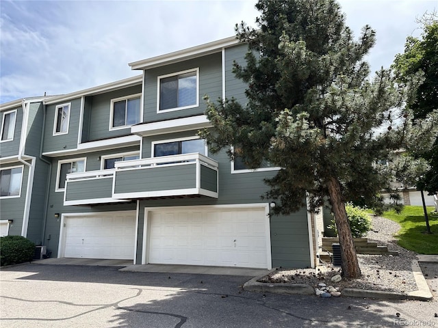 8753 W Cornell Ave Unit 12-1, Denver, CO 80227 - view of front of property with a garage