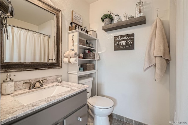 5843 Ceylon St, Denver, CO 80249 - full bath featuring toilet and vanity