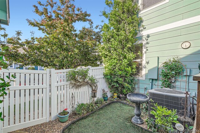 5843 Ceylon St, Denver, CO 80249 - view of yard featuring central AC
