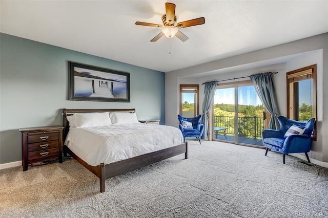 bedroom featuring access to outside, ceiling fan, and carpet flooring