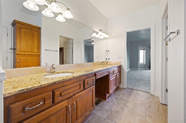 bathroom with vanity and ceiling fan