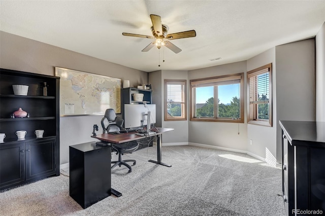 office with ceiling fan, light carpet, and a wealth of natural light