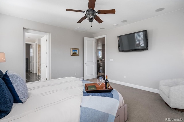 bedroom with carpet, baseboards, and ceiling fan