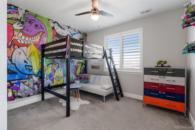 carpeted bedroom with baseboards, visible vents, and ceiling fan