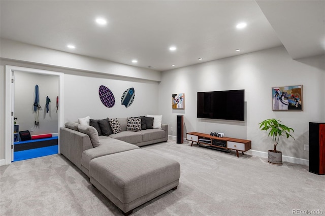 living room with recessed lighting, carpet floors, and baseboards