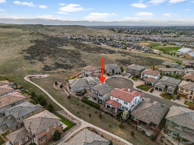 aerial view with a residential view and a mountain view