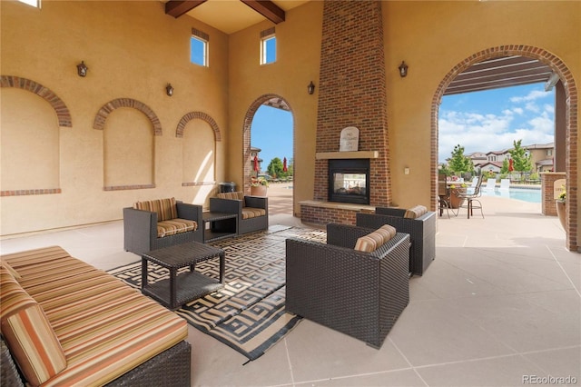 9724 Cantabria Pt, Lone Tree, CO 80124 - view of patio / terrace featuring an outdoor living space with a fireplace and an outdoor pool