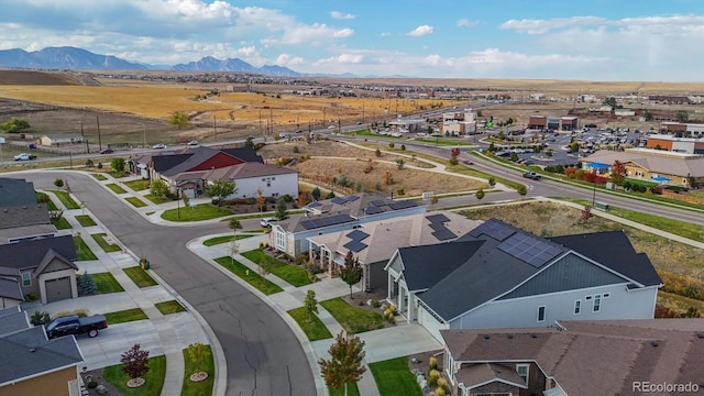 aerial view featuring a residential view and a mountain view