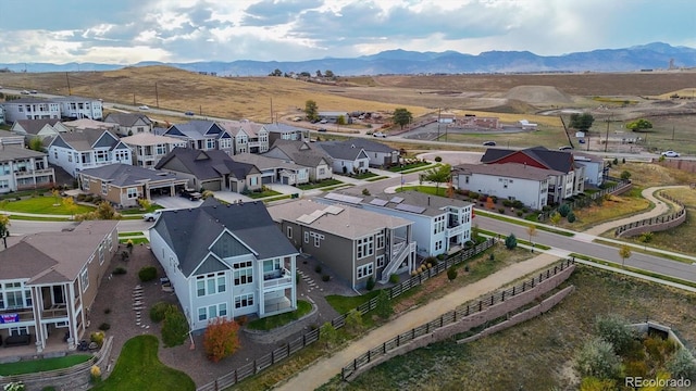 birds eye view of property with a residential view and a mountain view