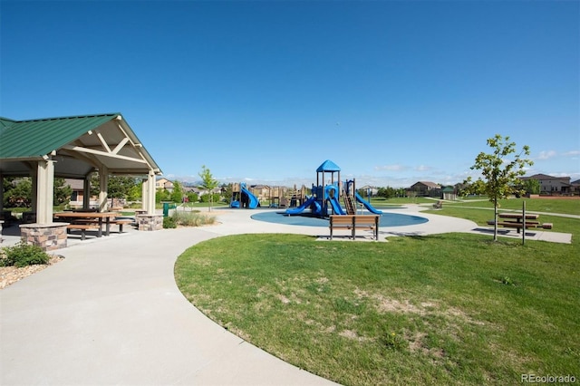 community jungle gym with a yard and a gazebo