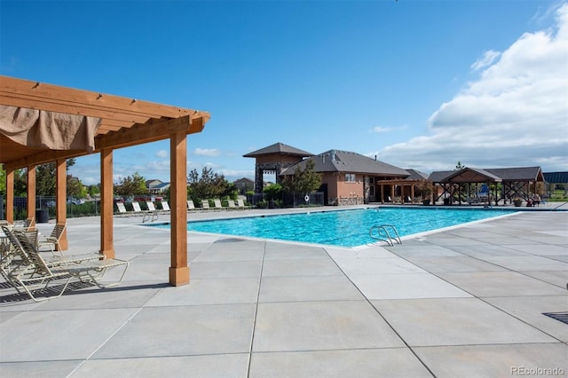 community pool featuring a patio area and a pergola