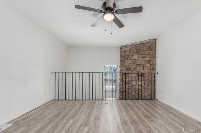 3281 S Estes St, Lakewood, CO 80227 - spare room with wood finished floors and ceiling fan