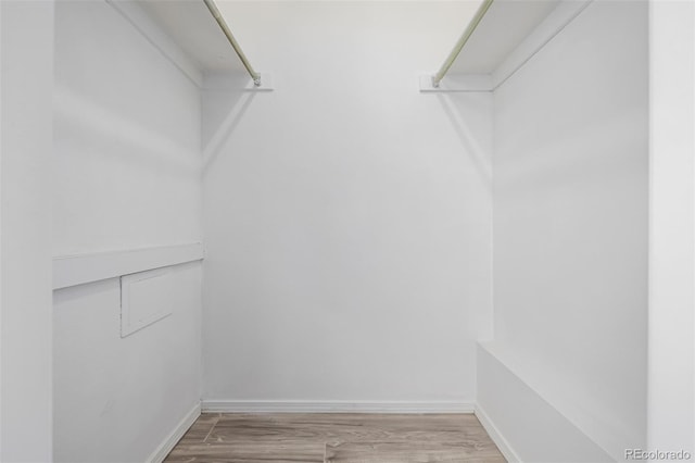 3281 S Estes St, Lakewood, CO 80227 - walk in closet with light wood finished floors