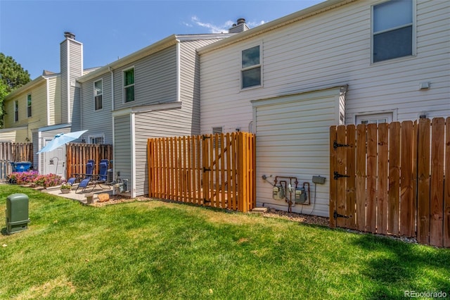 3281 S Estes St, Lakewood, CO 80227 - back of property with a patio area