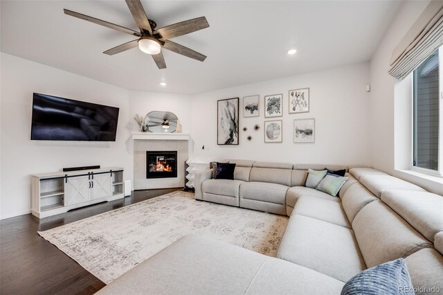 16673 E Virginia Ave, Aurora, CO 80017 - living area featuring a ceiling fan, recessed lighting, wood finished floors, and a tile fireplace
