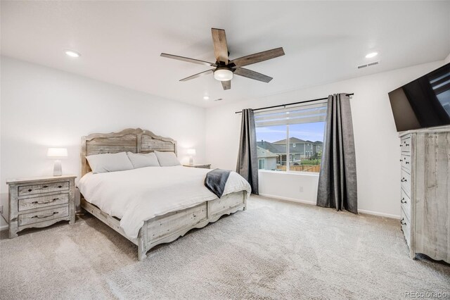 16673 E Virginia Ave, Aurora, CO 80017 - carpeted bedroom with recessed lighting, baseboards, and a ceiling fan