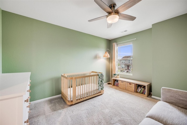 16673 E Virginia Ave, Aurora, CO 80017 - carpeted bedroom featuring ceiling fan and baseboards