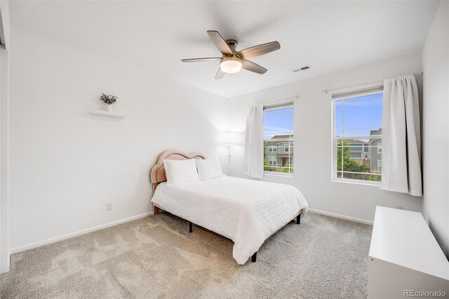 16673 E Virginia Ave, Aurora, CO 80017 - bedroom with baseboards, carpet flooring, and a ceiling fan