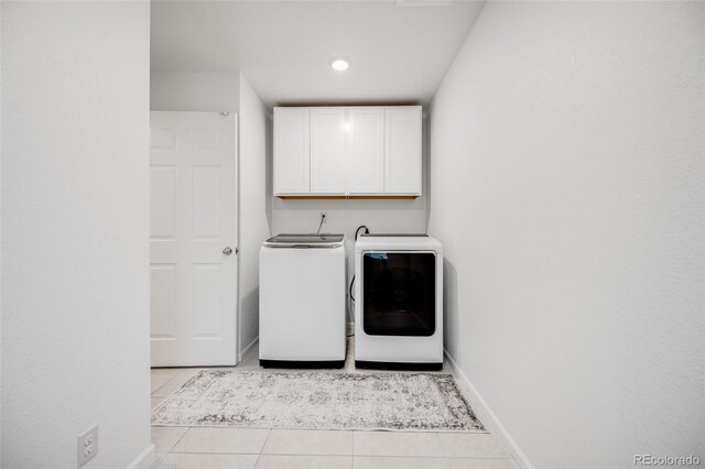 16673 E Virginia Ave, Aurora, CO 80017 - laundry room with cabinet space, washing machine and dryer, light tile patterned flooring, baseboards, and recessed lighting