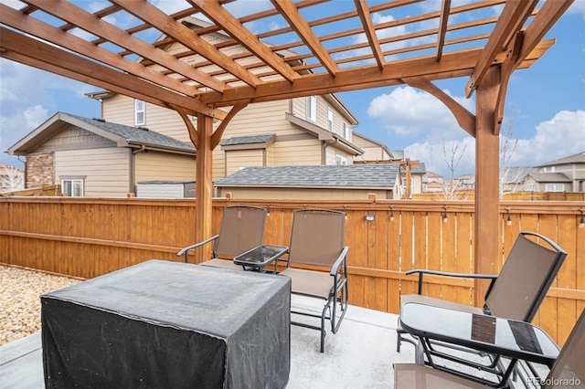 view of patio with an outdoor fire pit and a pergola