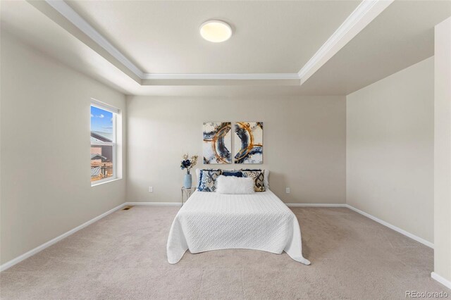 19131 E 65th Ave, Denver, CO 80249 - carpeted bedroom featuring a tray ceiling, ornamental molding, and baseboards