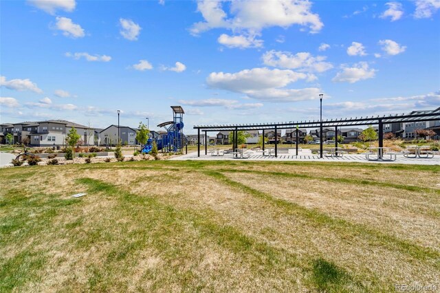 19131 E 65th Ave, Denver, CO 80249 - view of grassy yard featuring a residential view