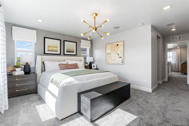 16897 W 92nd Dr, Arvada, CO 80007 - bedroom with light carpet, multiple windows, a chandelier, and recessed lighting