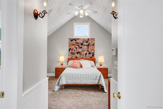 bedroom with ceiling fan, vaulted ceiling, and carpet