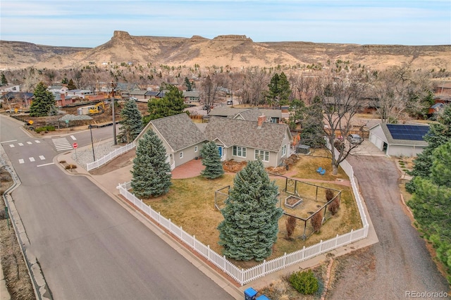 bird's eye view with a residential view and a mountain view