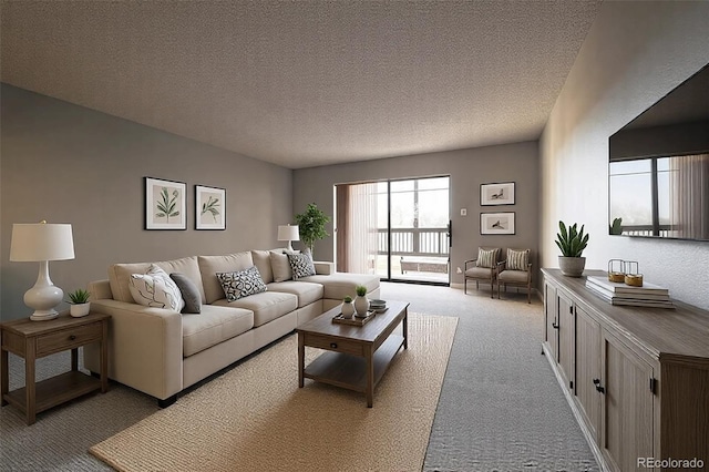 living area featuring light colored carpet and a textured ceiling