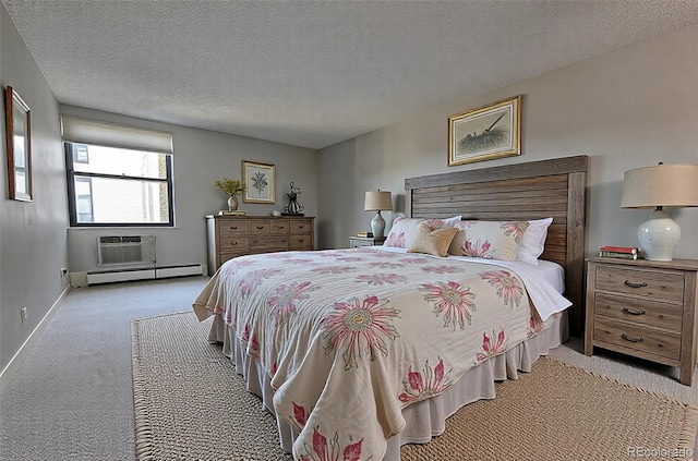 carpeted bedroom featuring a wall mounted air conditioner, a baseboard heating unit, baseboards, and a textured ceiling