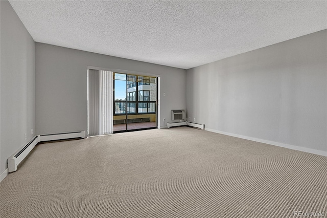 empty room featuring carpet flooring, baseboards, and baseboard heating