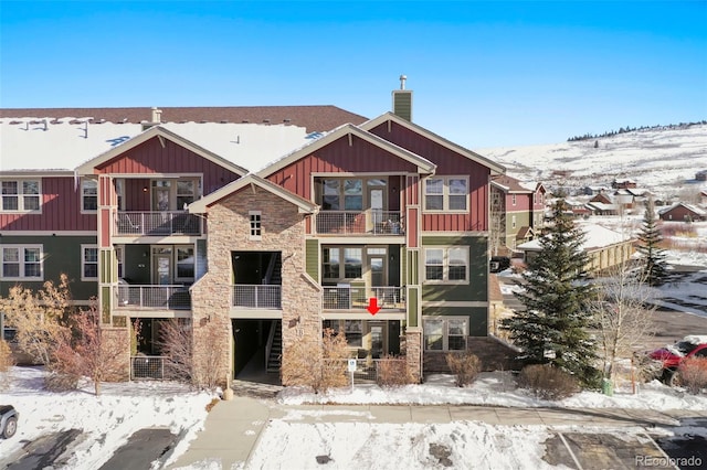 view of snow covered property