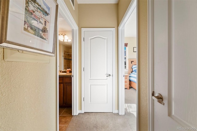 hall with light tile patterned flooring