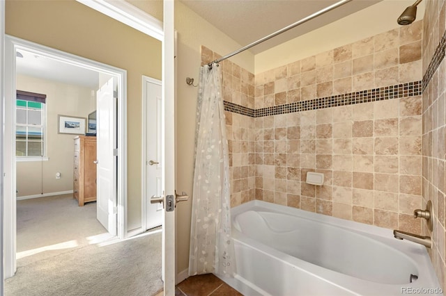 bathroom featuring shower / bathtub combination with curtain