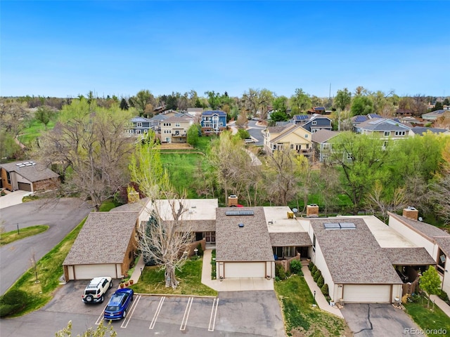 birds eye view of property with a residential view